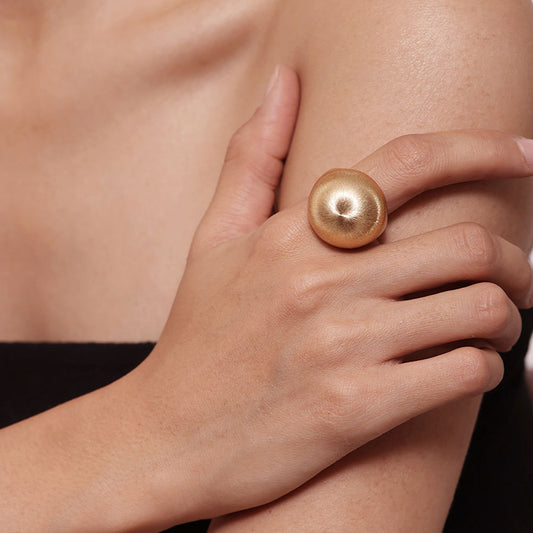 TIKOO brushed texture gold ring worn by model, perfect for minimalist statement jewelry looks.