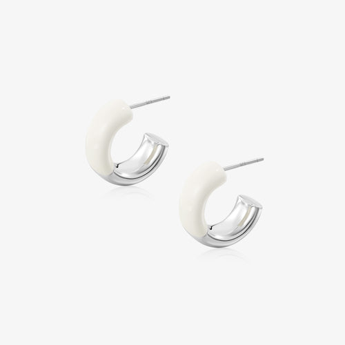 TIKOO original white enamel and thick white gold plated C-shaped hoop earrings on white background.