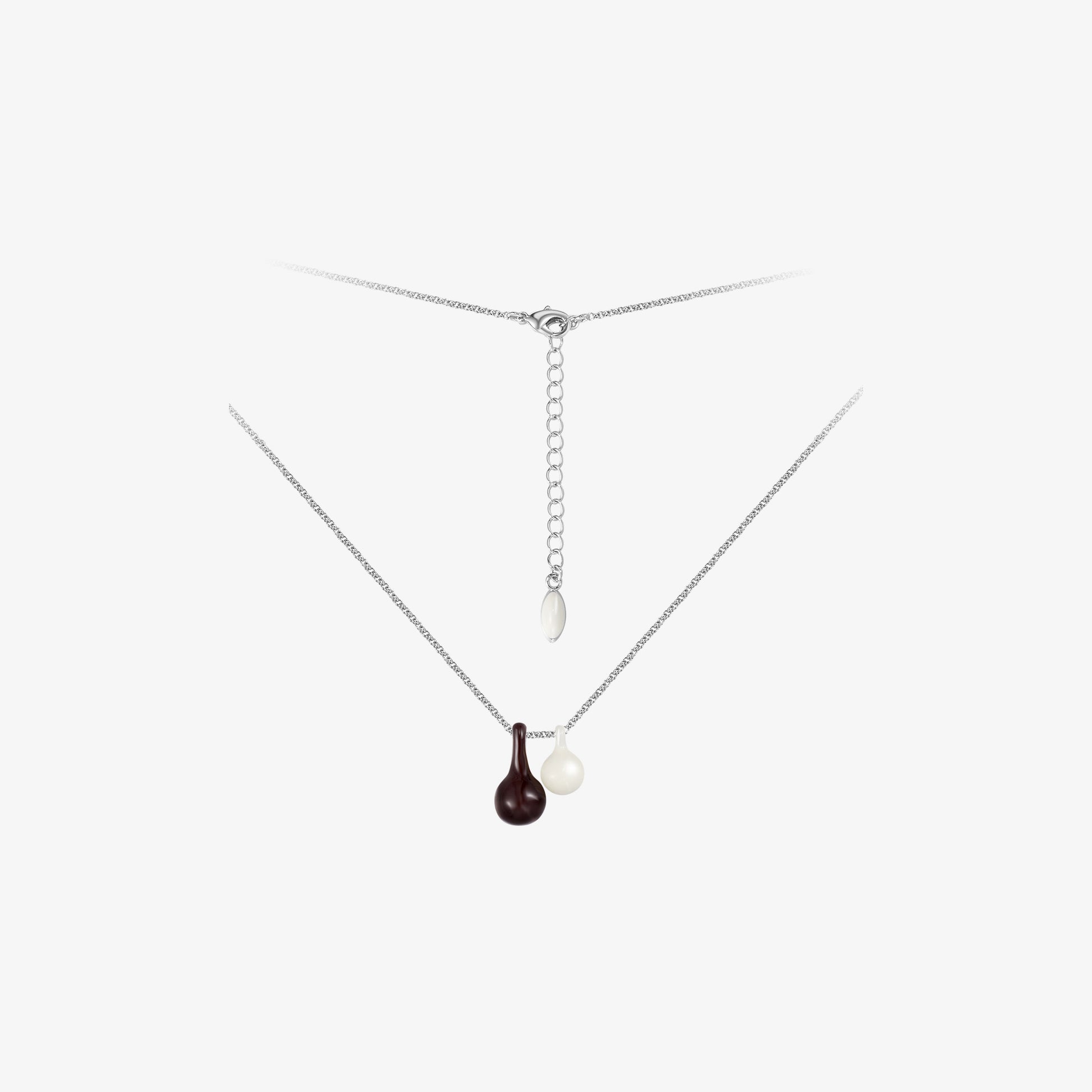 TIKOO brand original design gourd-shaped pendant necklace with brown and white cold enamel, platinum-plated silver tone chain on white background.