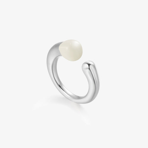 TIKOO original design open ring featuring a white cold enamel drop and thick platinum plated organic band.