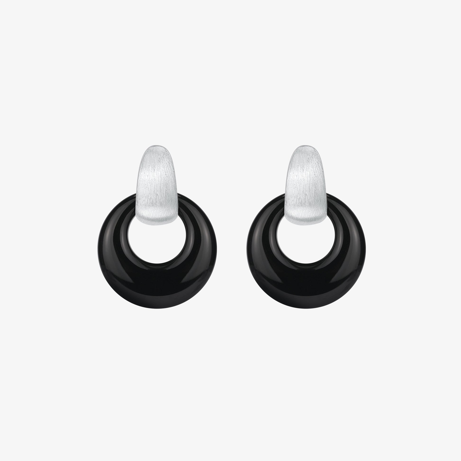 A pair of TIKOO original design earrings featuring natural black onyx donuts suspended from platinum-plated textured studs, set against a clean white background.