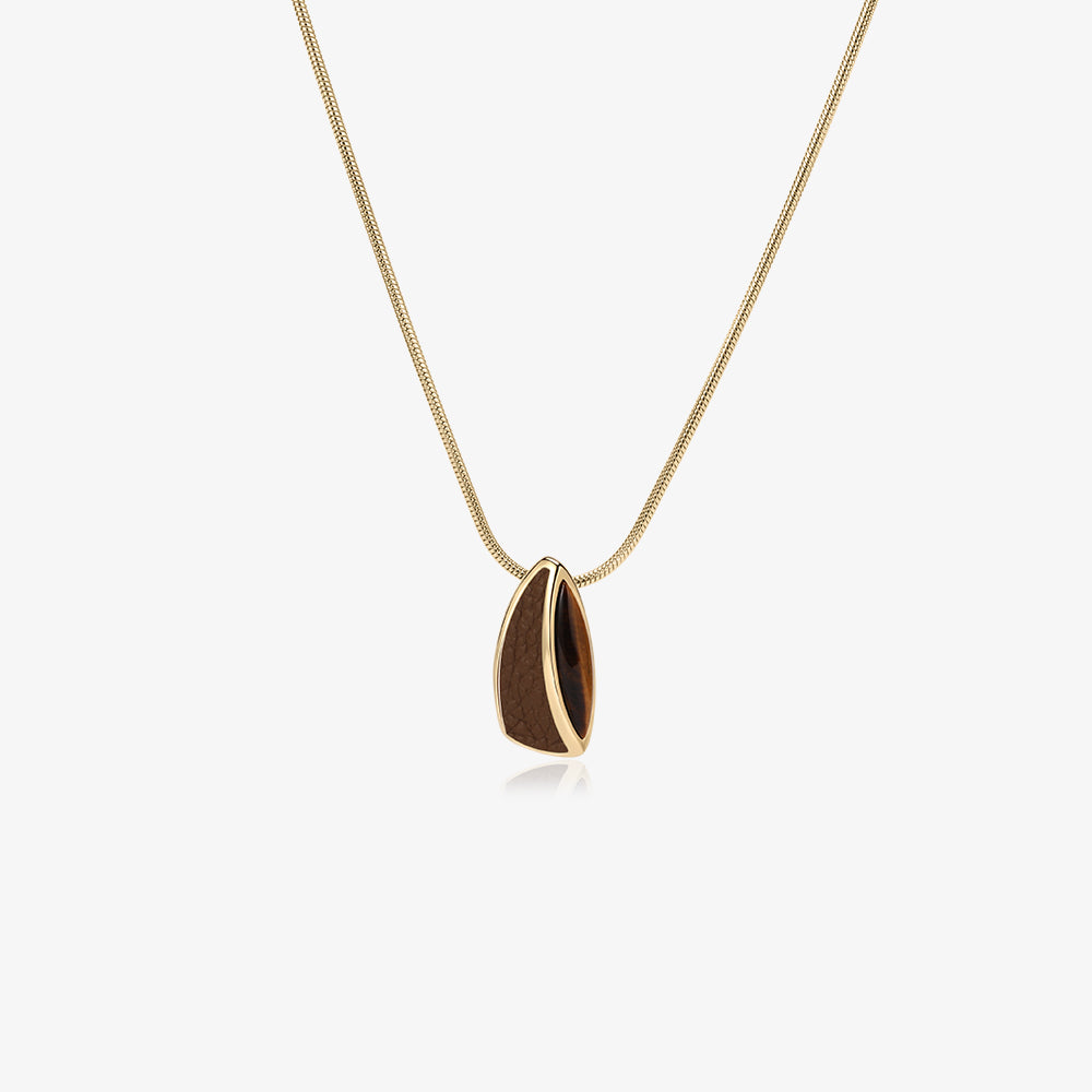 TIKOO original sculptural pendant necklace with natural tiger's eye and brown leather inlay, thick 18K gold plated.