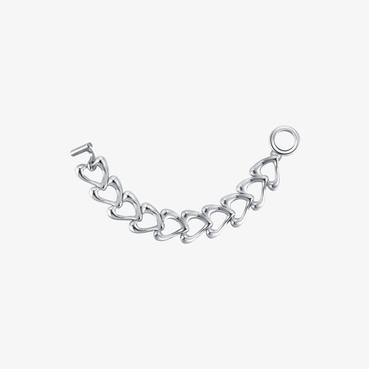 TIKOO original design sculptural heart link bracelet with OT toggle clasp and thick platinum plating on white background.