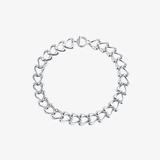 TIKOO original design heart link necklace with thick platinum plating and a front OT toggle clasp on a white background.