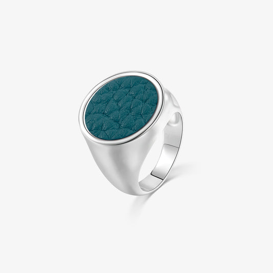 TIKOO original teal blue pebbled leather inlay signet ring with thick white gold plating and a chunky round face.