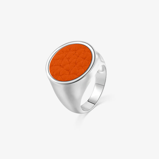 TIKOO original bright orange pebbled leather inlay signet ring with thick white gold plating and a round face.