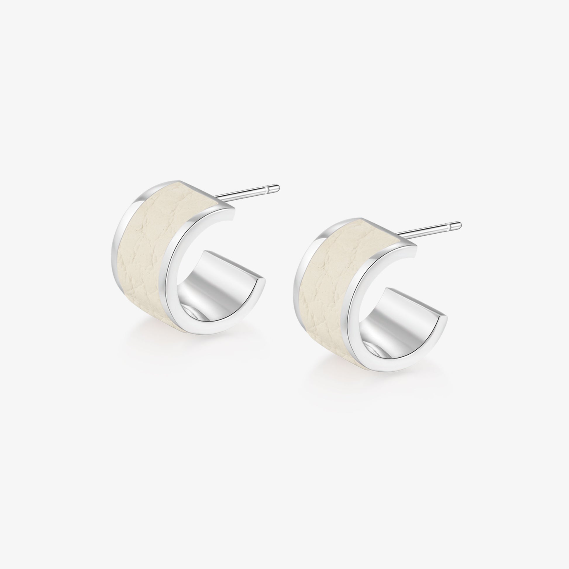 TIKOO original design hoop earrings featuring cream-colored genuine leather inlay and thick white gold plating on a white background.