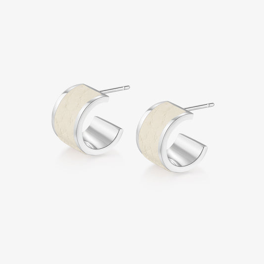 TIKOO original design hoop earrings featuring cream-colored genuine leather inlay and thick white gold plating on a white background.