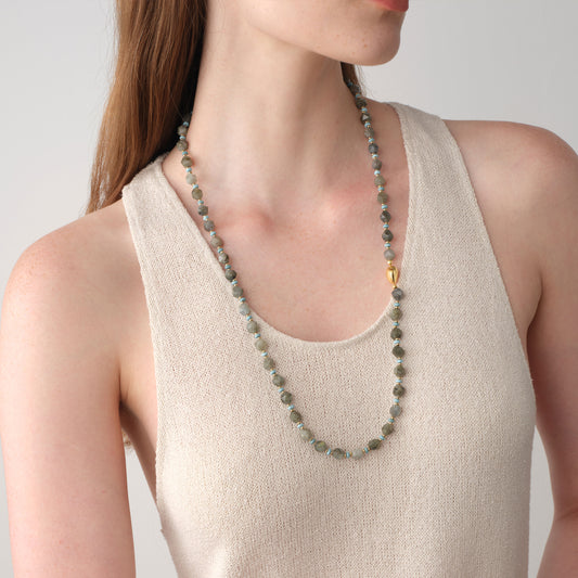 Detail shot of the 18K gold plated magnetic clasp on the TIKOO labradorite long necklace, highlighting ease of use and luxury finish.