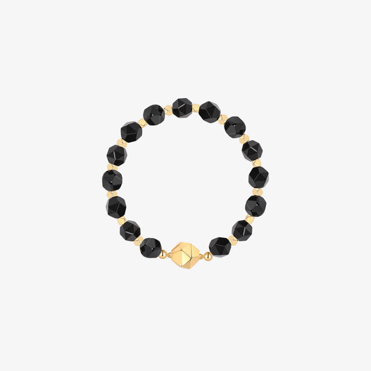 TIKOO brand original design natural black onyx beaded bracelet with thick 18K gold plated geometric center on a clean white background.