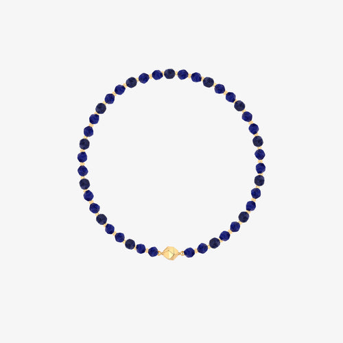TIKOO original design faceted blue sodalite beaded necklace with 18K gold plated geometric accents on a white background.