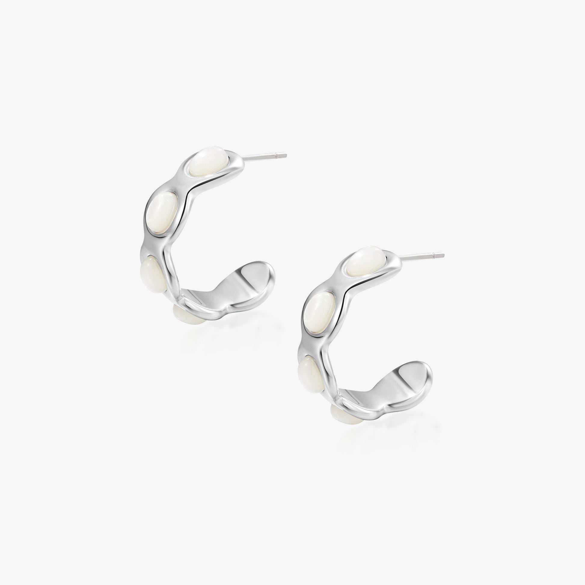 TIKOO original scalloped hoop earrings with white mother of pearl inlays and thick platinum plating.