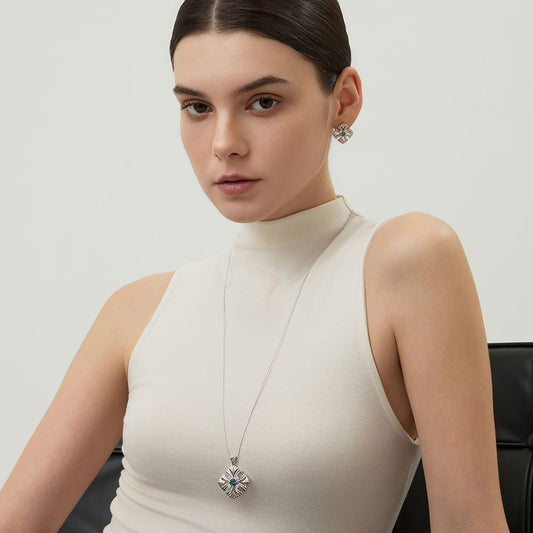 High-end fashion photography of TIKOO jewelry set with D-Color VVS Moissanite and platinum-plated copper.