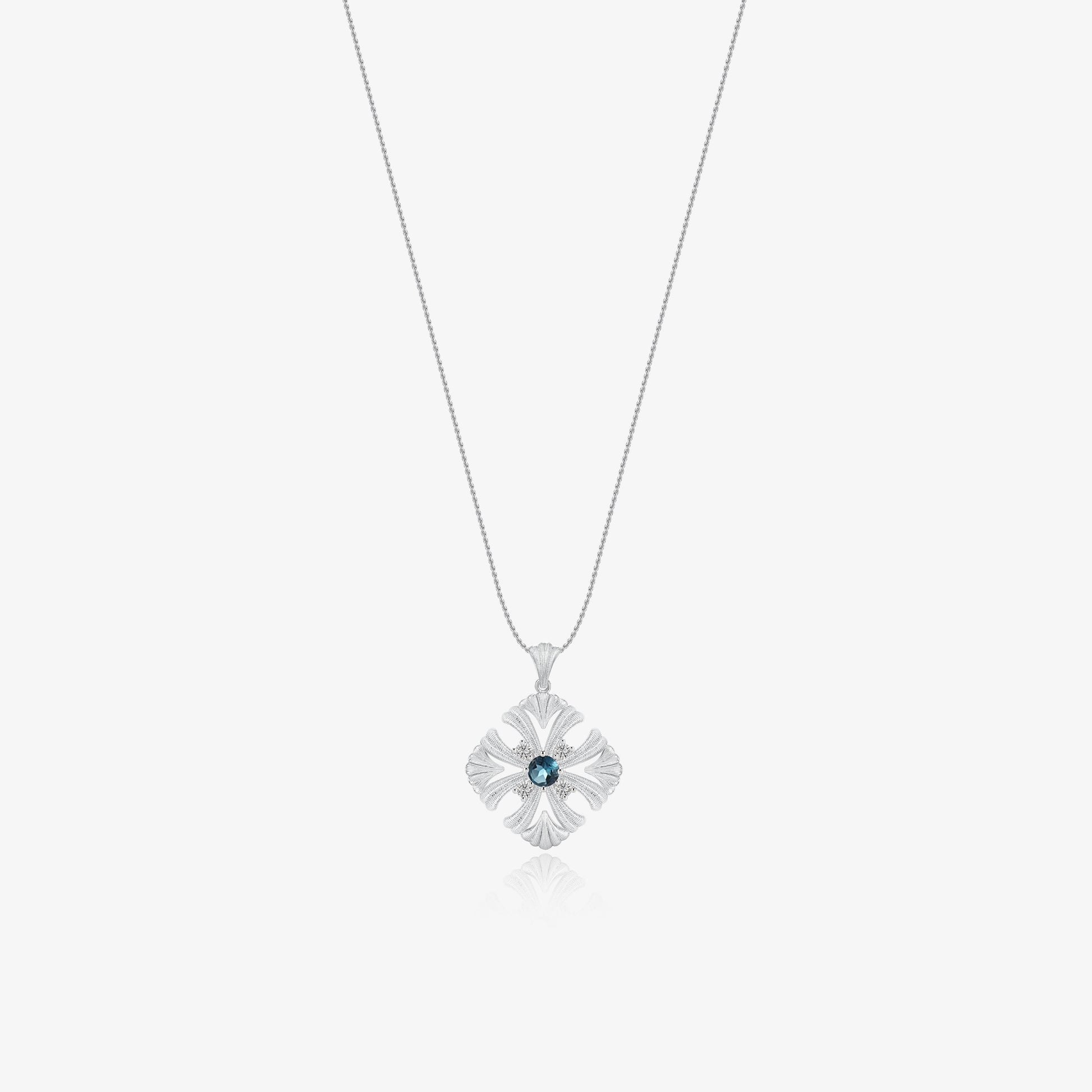 TIKOO original design long pendant necklace featuring a blue topaz center stone and moissanite accents on a white background.