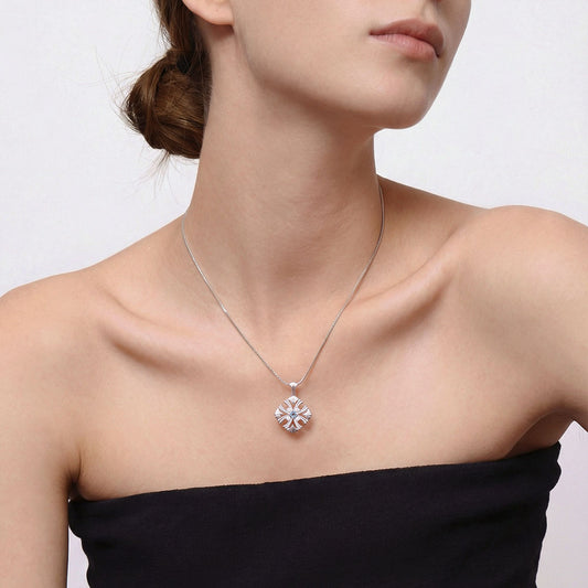 Close-up of a model wearing TIKOO Art Deco necklace featuring sparkling blue and white gemstones.