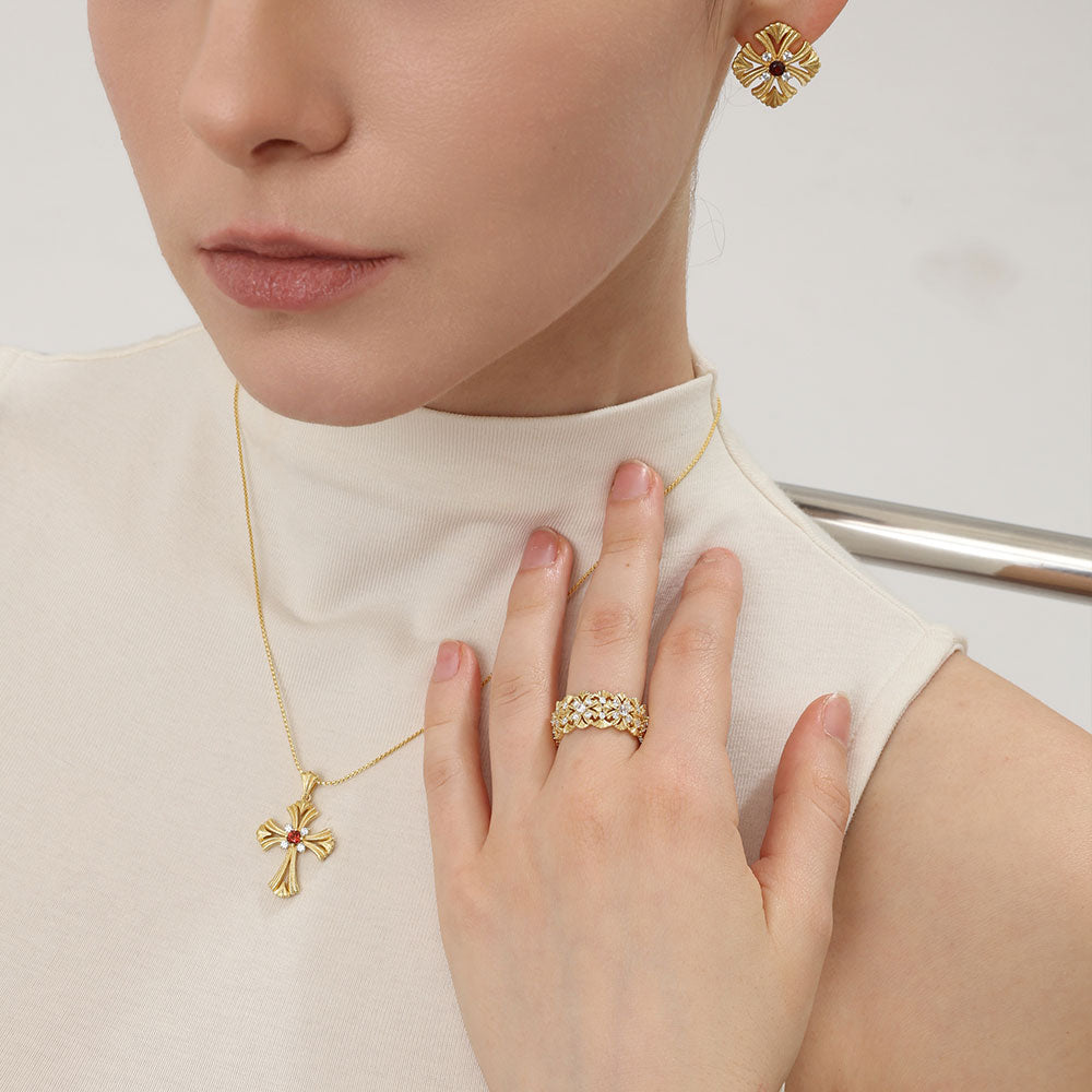Complete TIKOO jewelry set featuring the floral gold ring, cross earrings, and necklace.