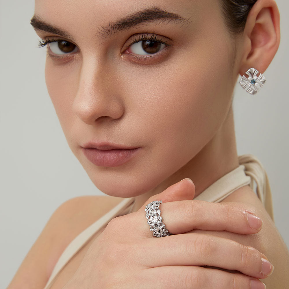 Fashion lifestyle shot of TIKOO D color VVS Moissanite ring, highlighting the brilliant sparkle.