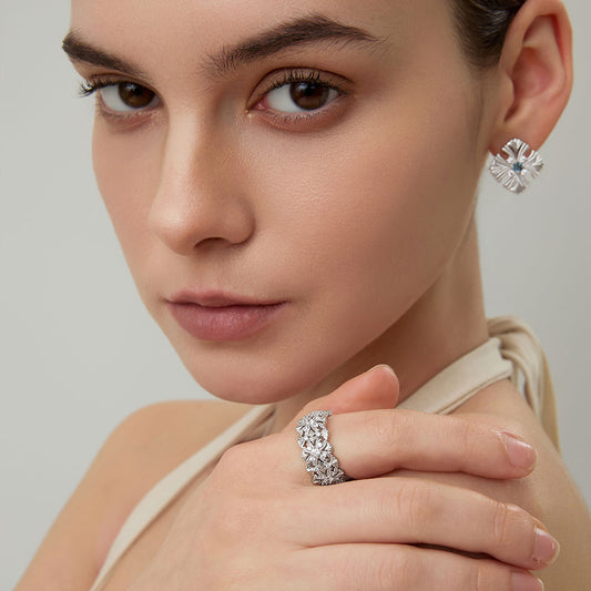 Fashion lifestyle shot of TIKOO D color VVS Moissanite ring, highlighting the brilliant sparkle.