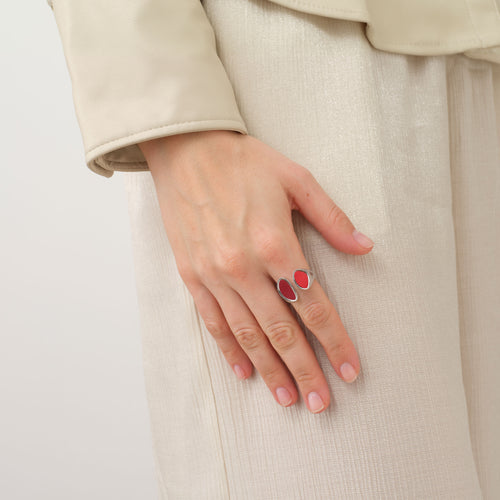 Fashion model wearing the TIKOO red leather inlay statement ring, showcasing a modern, bold jewelry aesthetic.