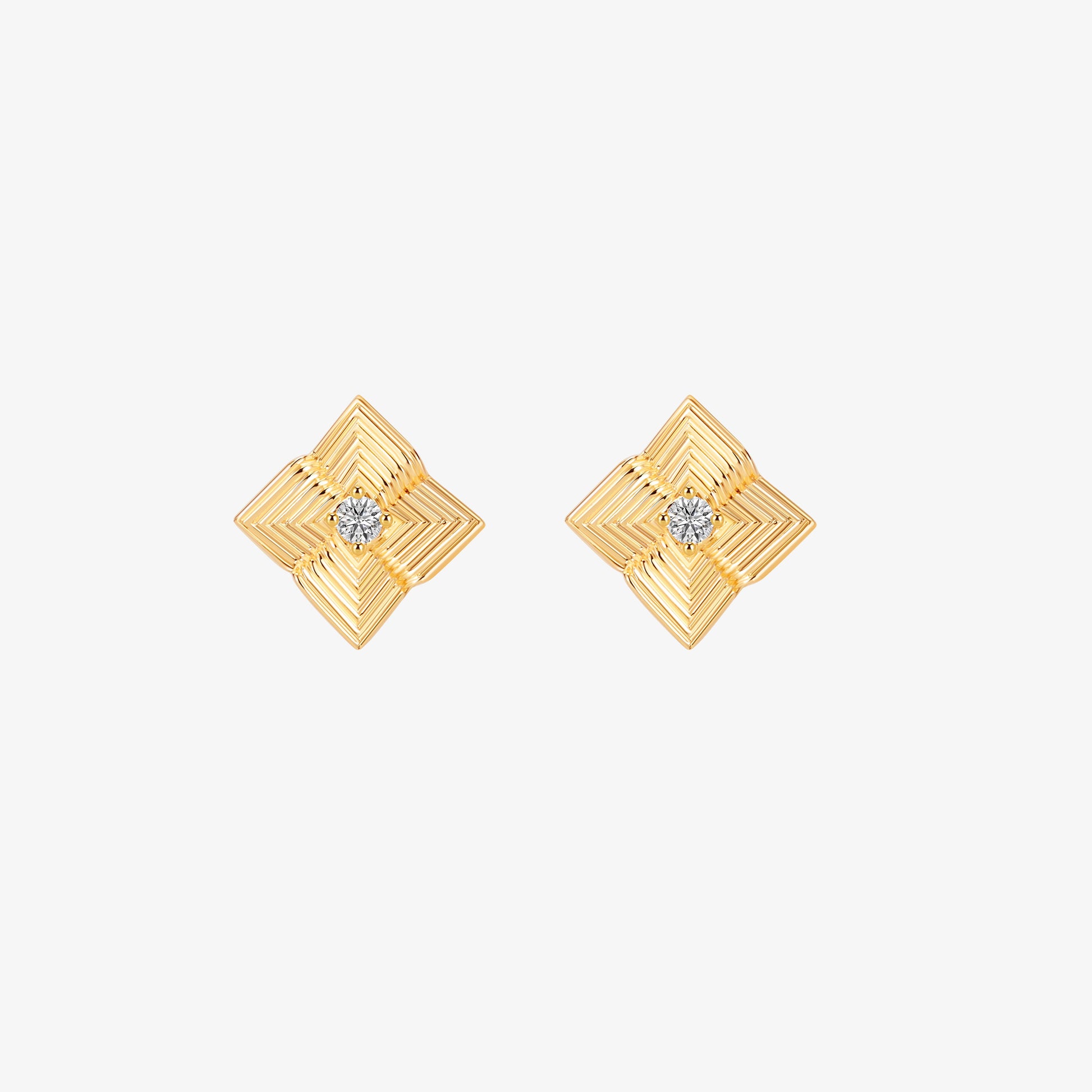 Product shot of TIKOO thick 18K gold plated stud earrings highlighting the high-polish finish.