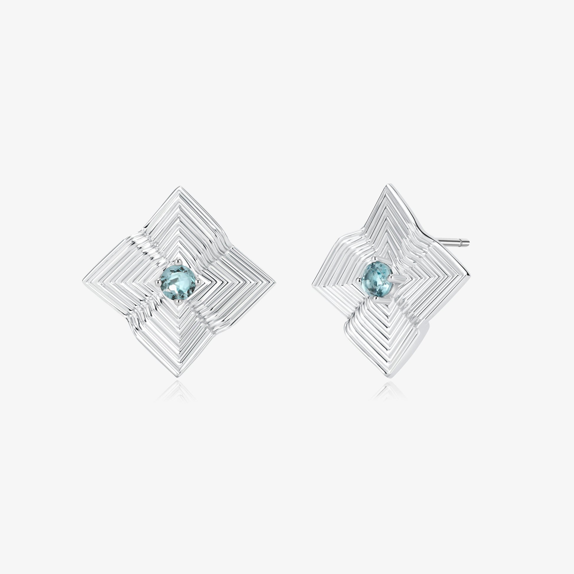 TIKOO original geometric starburst stud earrings featuring London blue topaz in a platinum plated setting.
