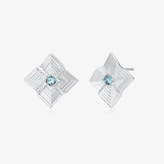 TIKOO original geometric starburst stud earrings featuring London blue topaz in a platinum plated setting.