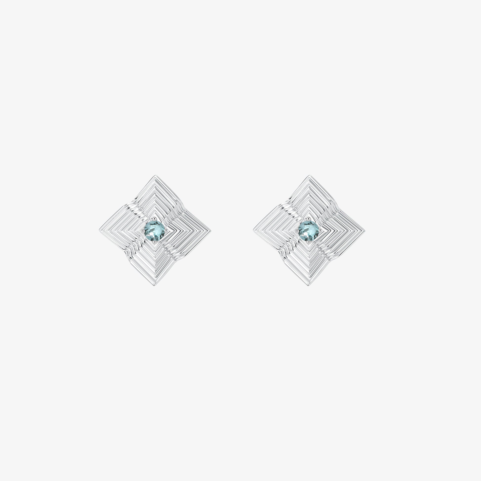 High-quality product photography of TIKOO blue gemstone earrings showing intricate geometric textures.
