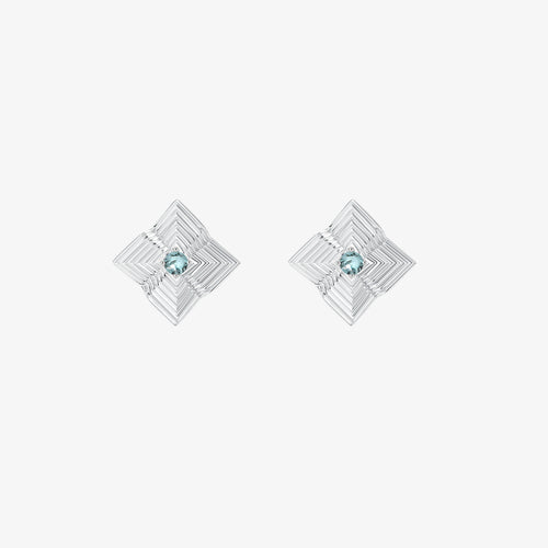 High-quality product photography of TIKOO blue gemstone earrings showing intricate geometric textures.